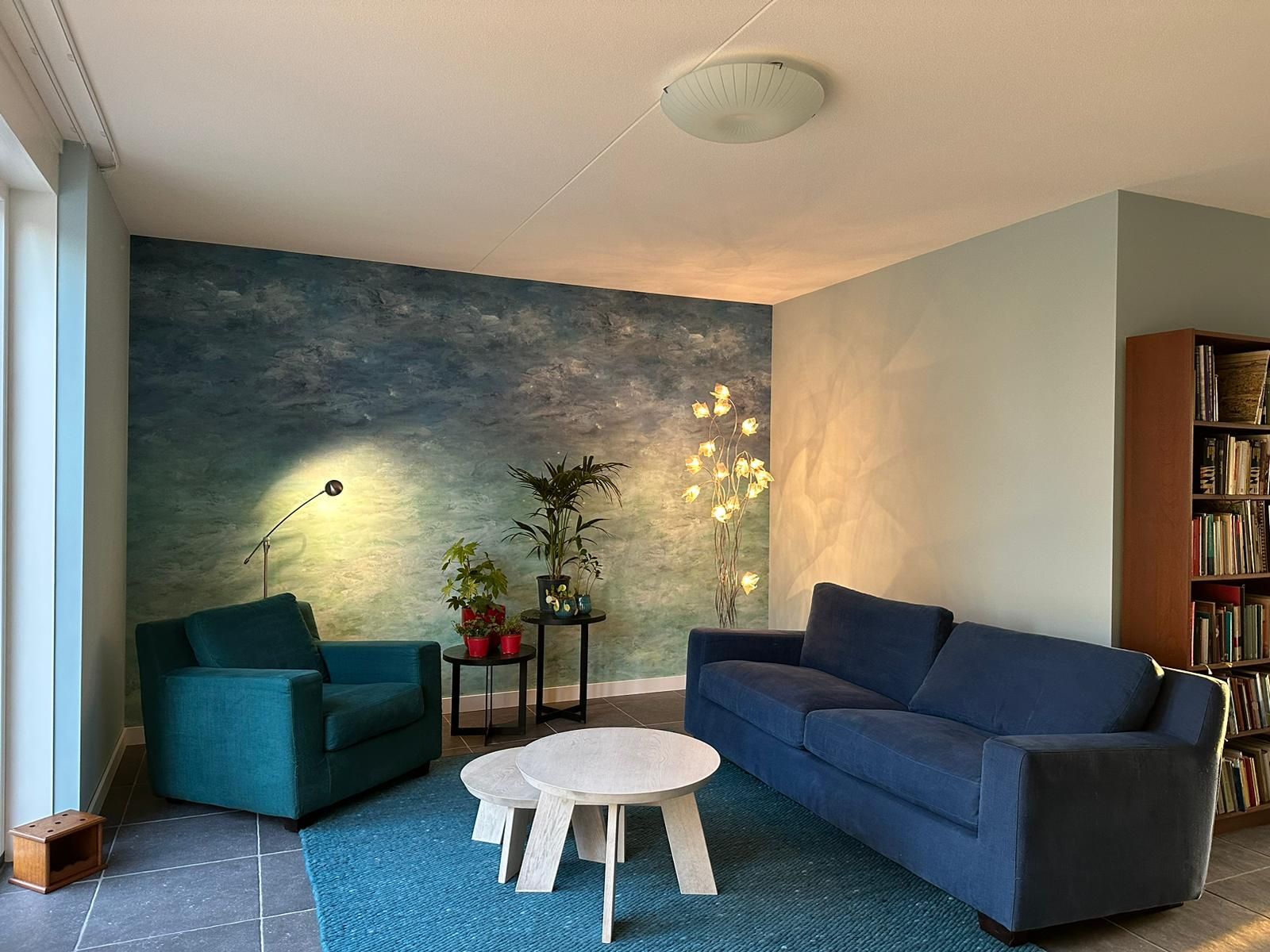 Portfolio: Fotobehang met wolkenlucht in woonkamer
